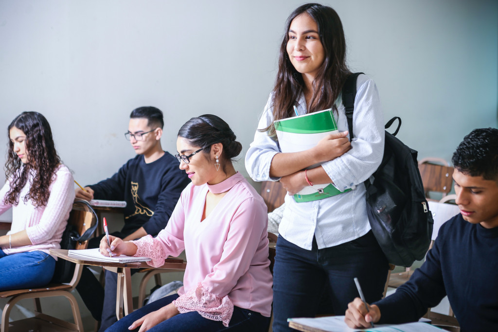 five students in a classroom